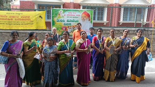 Image for Tulsi plant distribution at Sri Venkateshwara Temple.