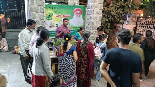 Image for Tulsi plant distribution at Ayappa Swamy Temple.