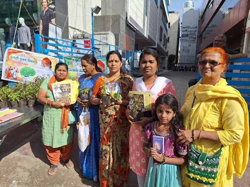 Tulsi plant distribution at Prasanna Ganapati Temple, Vimanpura.