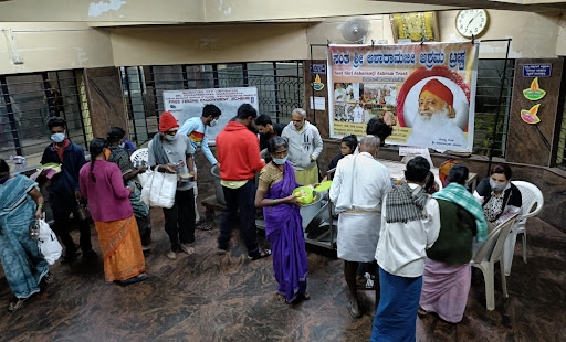 How were 250 patients satisfied with the Prasadam provided by the Bangalore Ashram Trust?